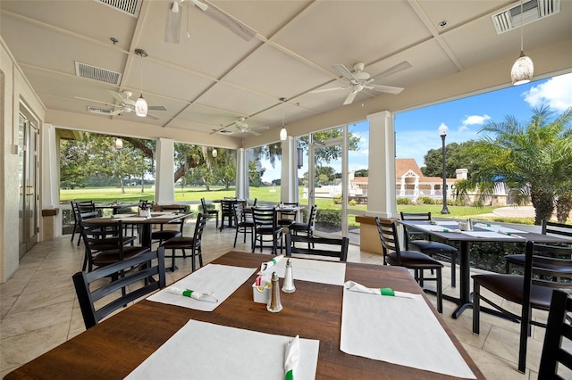 view of patio / terrace with outdoor dining space, visible vents, and a ceiling fan