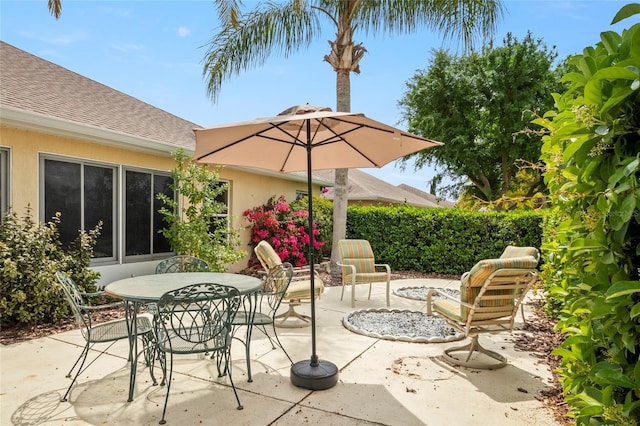 view of patio with outdoor dining space
