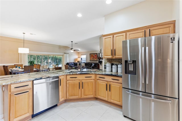 kitchen featuring ceiling fan, recessed lighting, stainless steel appliances, light tile patterned flooring, and light stone counters
