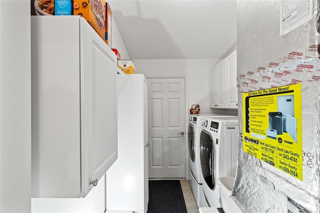 1526 Blueberry Way, The Villages, FL 32162 - laundry room featuring washer and dryer, a textured ceiling, and cabinet space