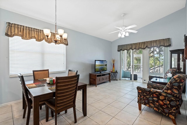 791 Wolf Creek St, Clermont, FL 34711 - dining room with a chandelier, lofted ceiling, light tile patterned floors, and a ceiling fan