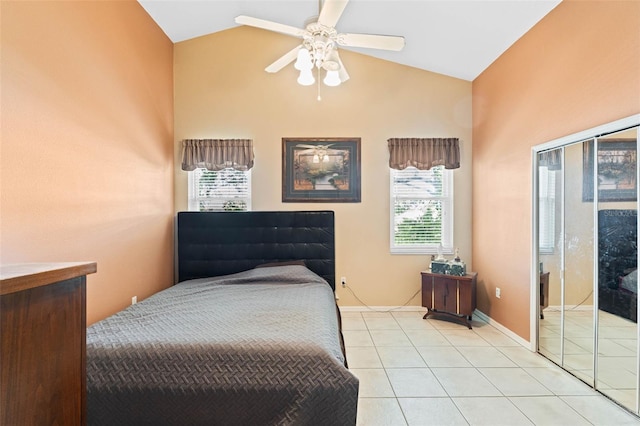 791 Wolf Creek St, Clermont, FL 34711 - bedroom with light tile patterned floors, high vaulted ceiling, and ceiling fan