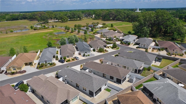 aerial view featuring a water view and a residential view