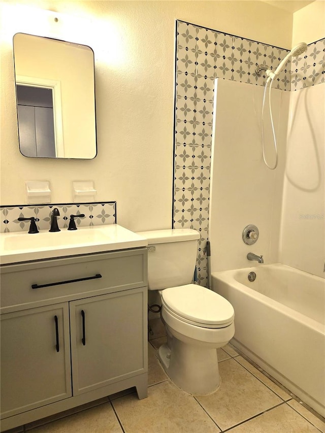 bathroom with tile patterned flooring, vanity, toilet, and shower / bath combination with curtain