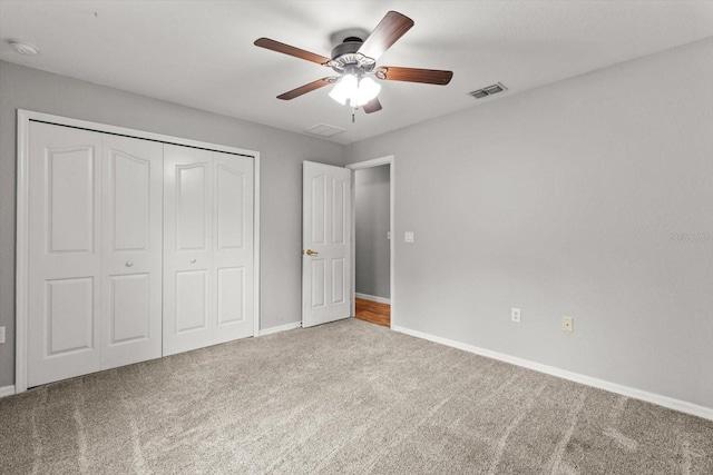 17 Eugenia Ct N, Homosassa, FL 34446 - unfurnished bedroom featuring ceiling fan, a closet, visible vents, carpet floors, and baseboards