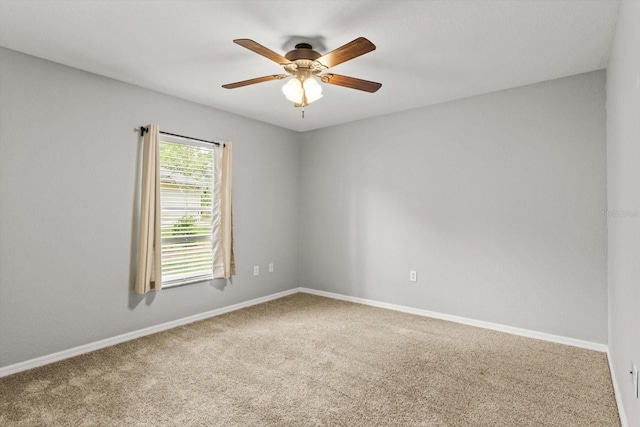 17 Eugenia Ct N, Homosassa, FL 34446 - carpeted empty room with baseboards and a ceiling fan