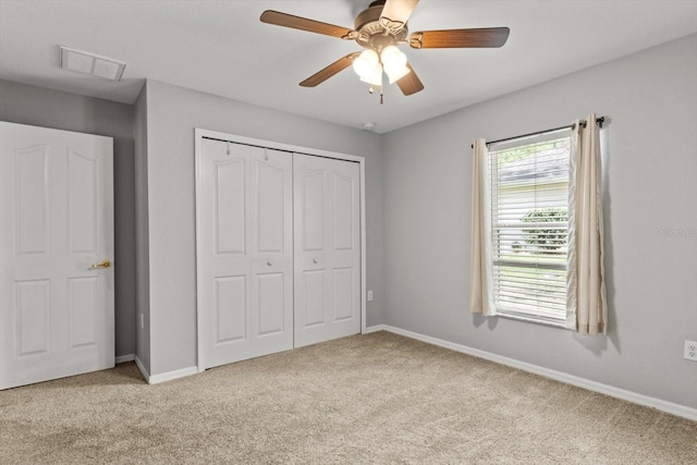 17 Eugenia Ct N, Homosassa, FL 34446 - unfurnished bedroom with visible vents, baseboards, a closet, a ceiling fan, and carpet