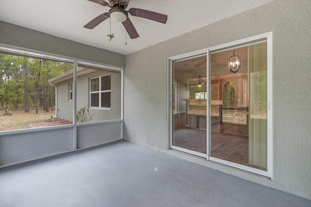 17 Eugenia Ct N, Homosassa, FL 34446 - unfurnished sunroom featuring a ceiling fan