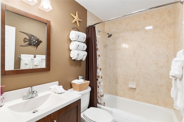 bathroom featuring shower / bath combination with curtain, vanity, a textured ceiling, and toilet