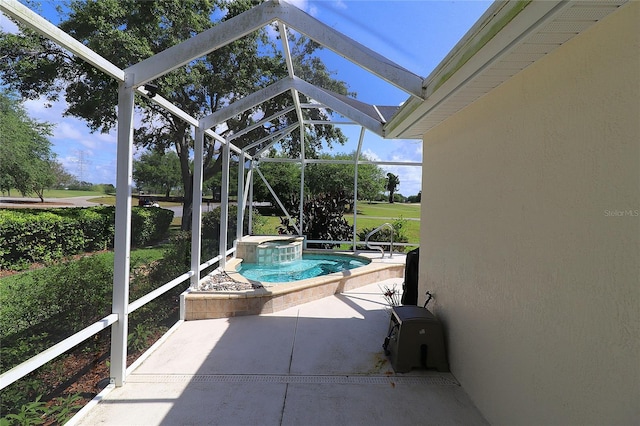 view of swimming pool with a lanai, a patio area, and a pool with connected hot tub