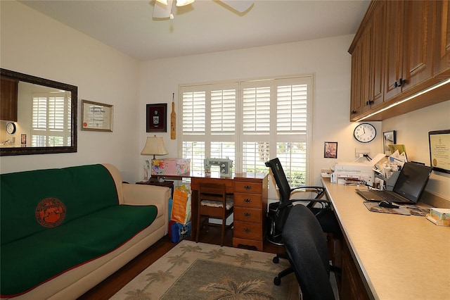 home office with wood finished floors and ceiling fan