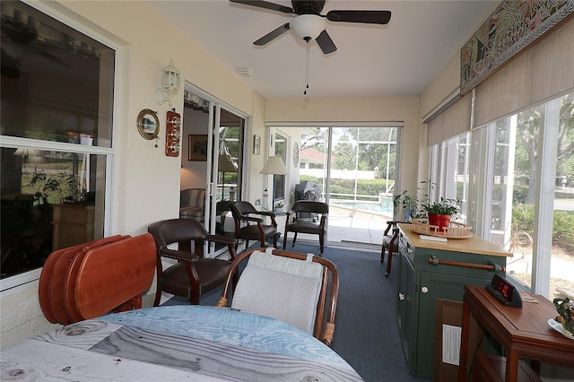 sunroom featuring visible vents and carpet