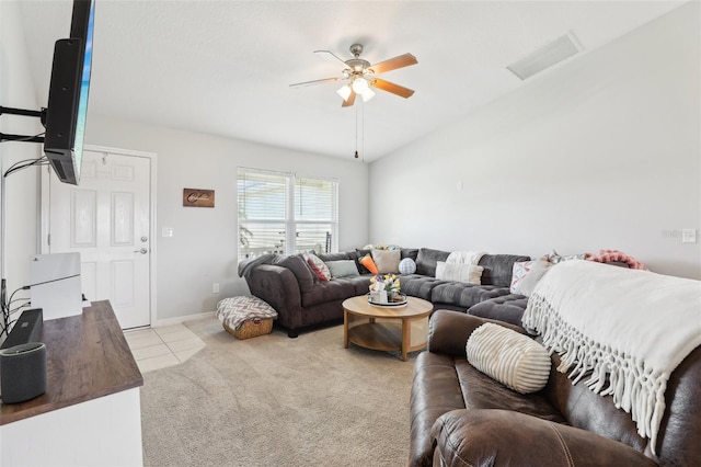 3329 Boyd Cir, Oxford, FL 34484 - carpeted living room with a ceiling fan, tile patterned floors, and baseboards