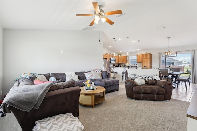 3329 Boyd Cir, Oxford, FL 34484 - living room with ceiling fan, a chandelier, light carpet, lofted ceiling, and recessed lighting