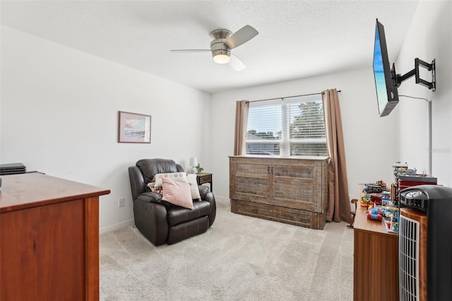 3329 Boyd Cir, Oxford, FL 34484 - living area featuring a ceiling fan, carpet, and baseboards