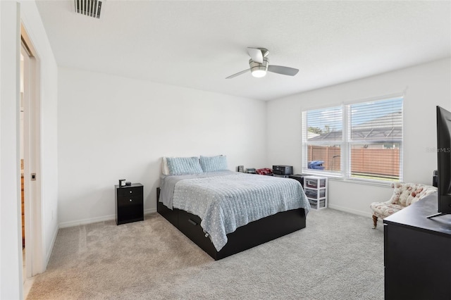 3329 Boyd Cir, Oxford, FL 34484 - bedroom with carpet, baseboards, and ceiling fan