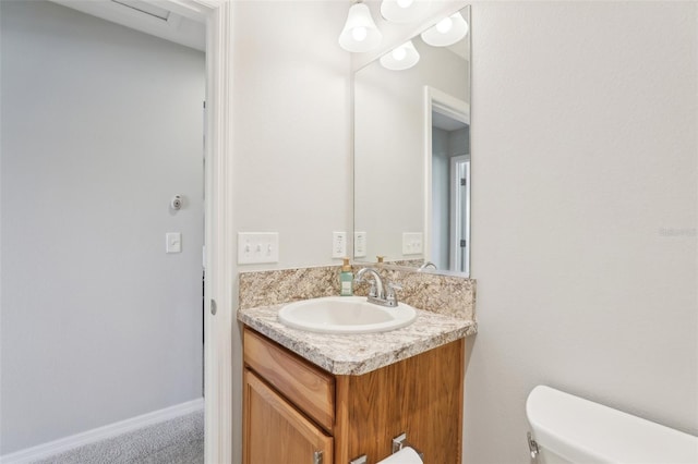 3329 Boyd Cir, Oxford, FL 34484 - bathroom featuring vanity, toilet, and baseboards