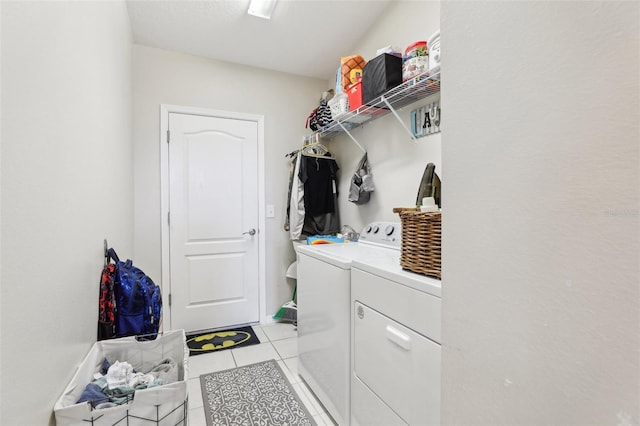 3329 Boyd Cir, Oxford, FL 34484 - washroom with separate washer and dryer and light tile patterned floors