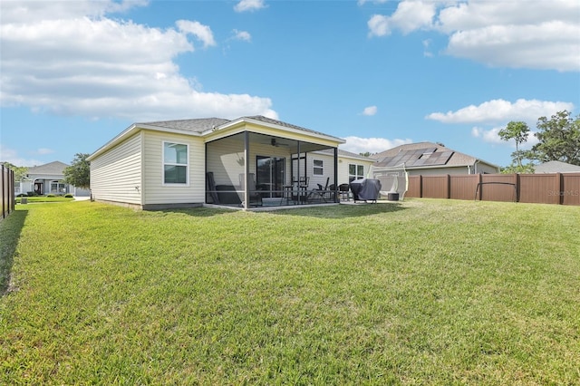 3329 Boyd Cir, Oxford, FL 34484 - rear view of house with a sunroom and ceiling fan