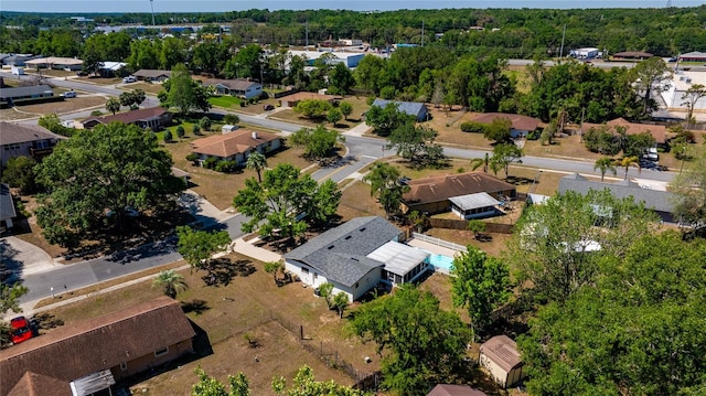 birds eye view of property with a residential view