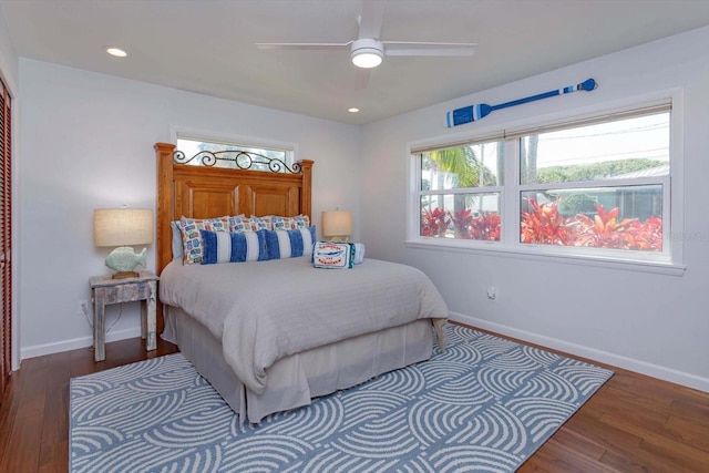 bedroom featuring baseboards, wood finished floors, recessed lighting, and ceiling fan