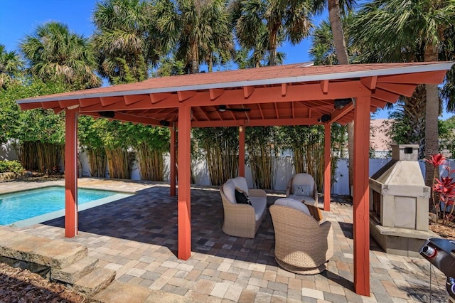 view of patio / terrace featuring a gazebo and a fenced backyard