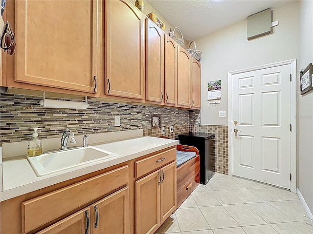 25523 Maurepas Ln, Leesburg, FL 34748 - laundry room featuring a sink and light tile patterned floors