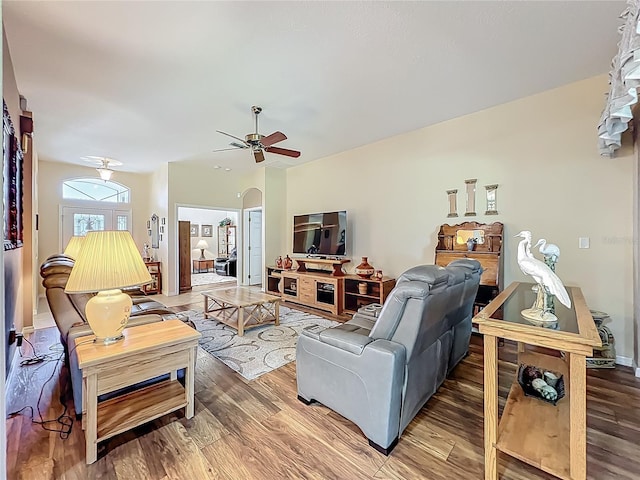 25523 Maurepas Ln, Leesburg, FL 34748 - living area with ceiling fan and wood finished floors