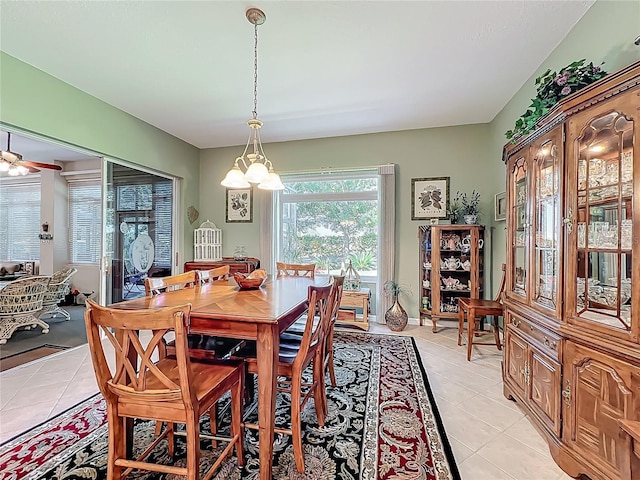 25523 Maurepas Ln, Leesburg, FL 34748 - dining room featuring a notable chandelier and light tile patterned flooring