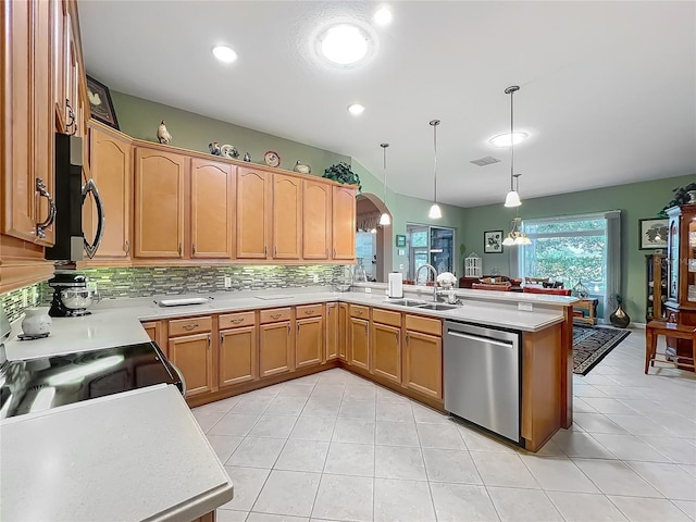 25523 Maurepas Ln, Leesburg, FL 34748 - kitchen with a peninsula, arched walkways, visible vents, dishwasher, and a sink