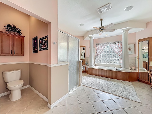 25523 Maurepas Ln, Leesburg, FL 34748 - bathroom with visible vents, toilet, ornate columns, a shower stall, and tile patterned floors