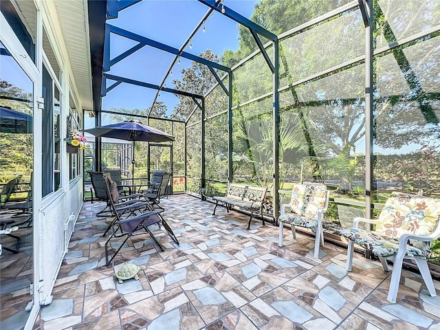 25523 Maurepas Ln, Leesburg, FL 34748 - view of patio with a lanai