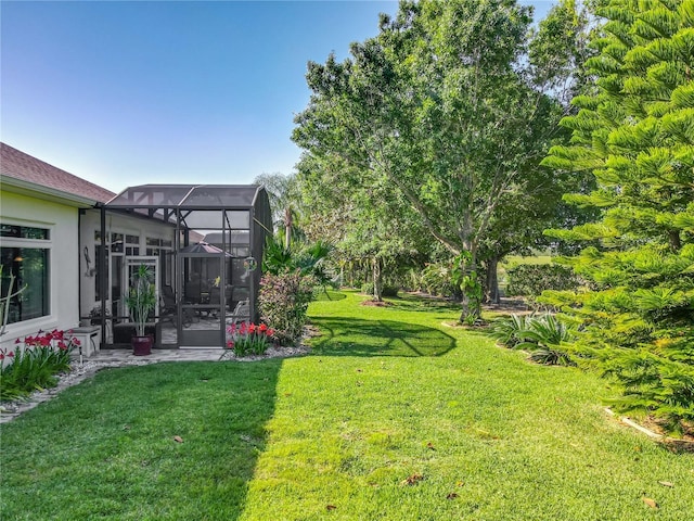 25523 Maurepas Ln, Leesburg, FL 34748 - view of yard featuring glass enclosure