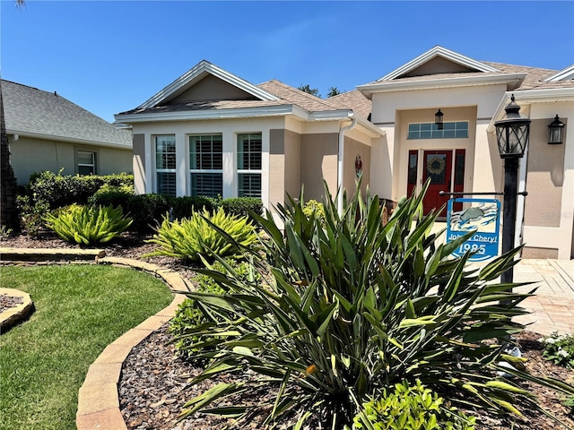 1985 Abordale Ln, The Villages, FL 32162 - view of front of house with stucco siding