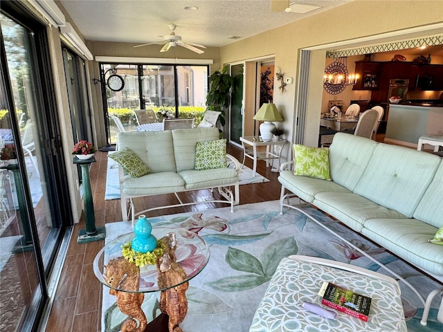1985 Abordale Ln, The Villages, FL 32162 - sunroom / solarium with a chandelier, visible vents, a textured ceiling, and wood finished floors