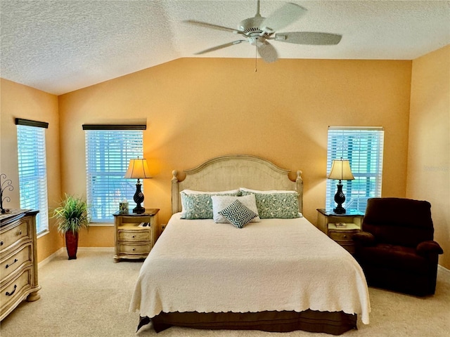 1985 Abordale Ln, The Villages, FL 32162 - carpeted bedroom with a textured ceiling, baseboards, multiple windows, and vaulted ceiling