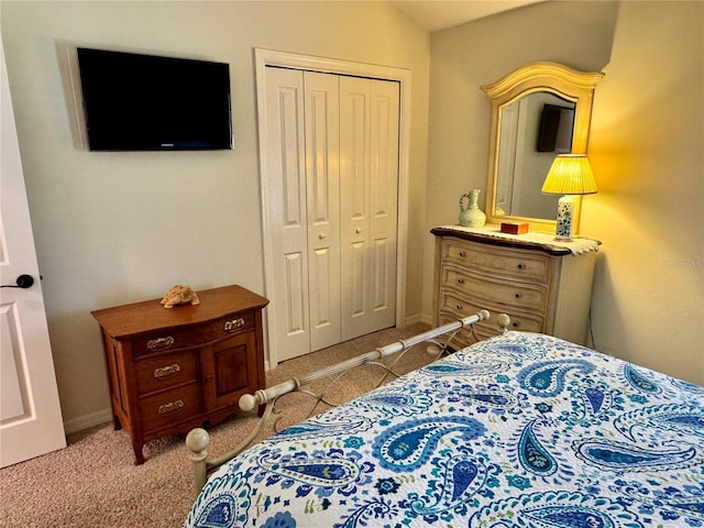 1985 Abordale Ln, The Villages, FL 32162 - bedroom with light carpet, a closet, and baseboards