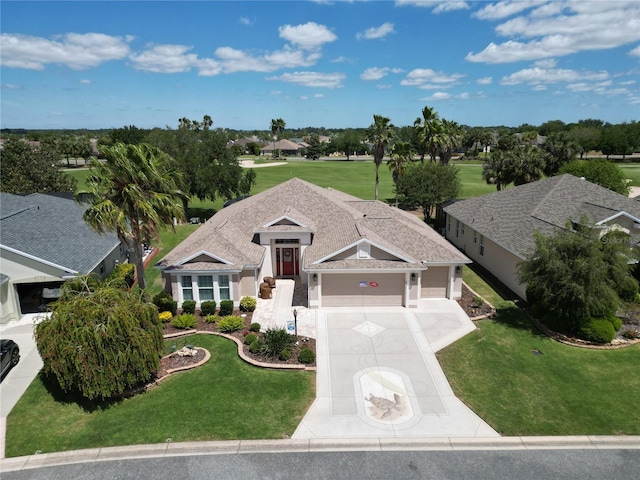 1985 Abordale Ln, The Villages, FL 32162 - ranch-style house featuring a garage, driveway, stucco siding, and a front lawn