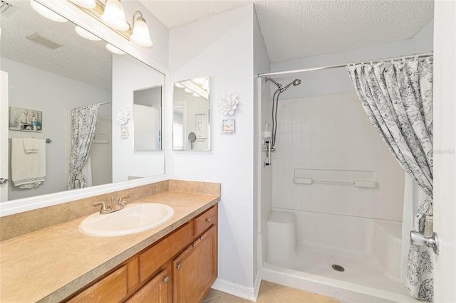 312 Emmalee Pl, The Villages, FL 32162 - bathroom with curtained shower, vanity, visible vents, and a textured ceiling