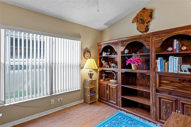 3603 Westerham Dr, Clermont, FL 34711 - interior space featuring baseboards, a textured ceiling, a ceiling fan, and wood finished floors