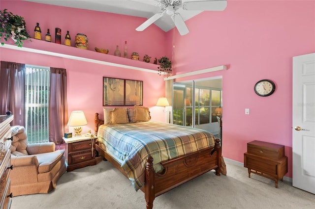 3603 Westerham Dr, Clermont, FL 34711 - bedroom with carpet flooring, a towering ceiling, multiple windows, and a ceiling fan