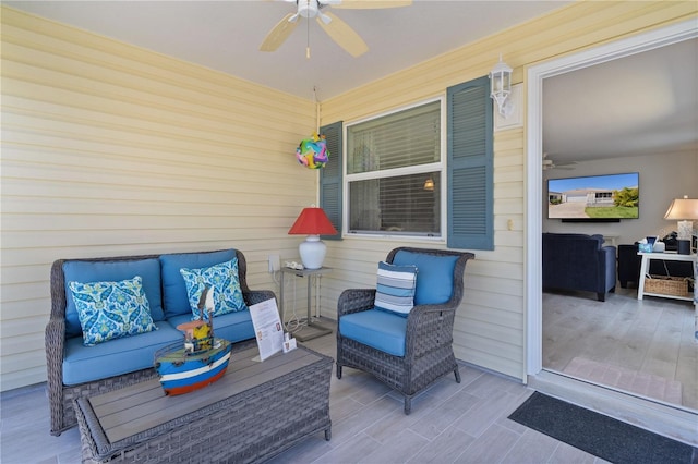 view of patio / terrace featuring an outdoor living space and a ceiling fan