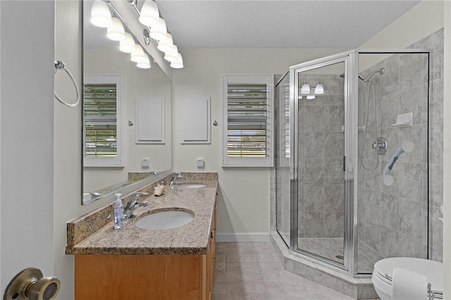 1358 E Schwartz Blvd, The Villages, FL 32159 - bathroom with toilet, a sink, tile patterned flooring, and a stall shower
