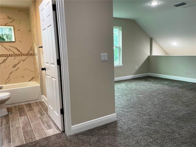 bonus room featuring baseboards, vaulted ceiling, visible vents, and recessed lighting