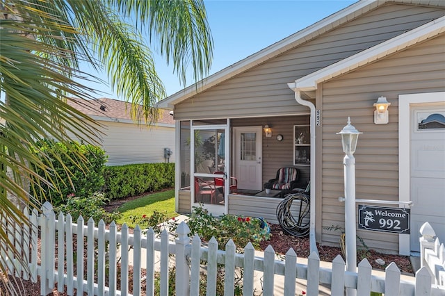 property entrance featuring fence