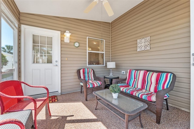 view of patio / terrace with an outdoor living space and a ceiling fan