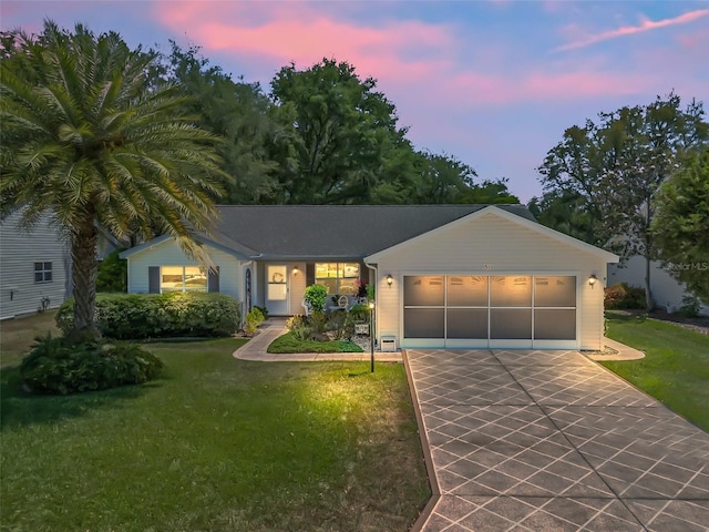 511 Chula Vista Ave, The Villages, FL 32159 - ranch-style house with concrete driveway, a garage, and a front yard
