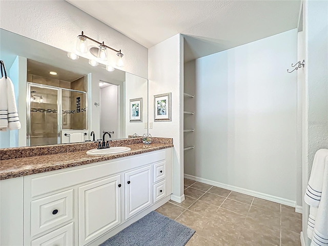 203 SE 30th Ave, Ocala, FL 34471 - full bath with a stall shower, vanity, tile patterned floors, and baseboards