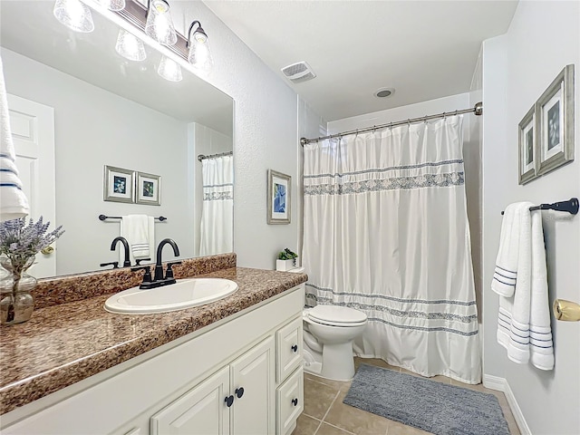 203 SE 30th Ave, Ocala, FL 34471 - bathroom with vanity, toilet, tile patterned floors, and a shower with shower curtain
