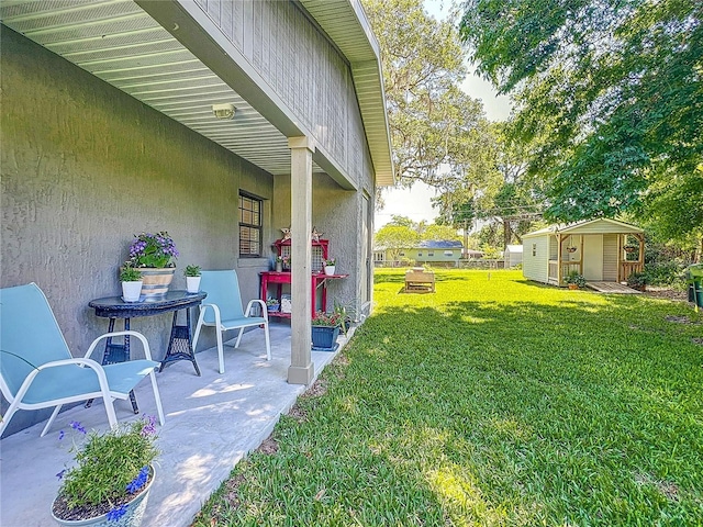 203 SE 30th Ave, Ocala, FL 34471 - view of green lawn featuring a patio